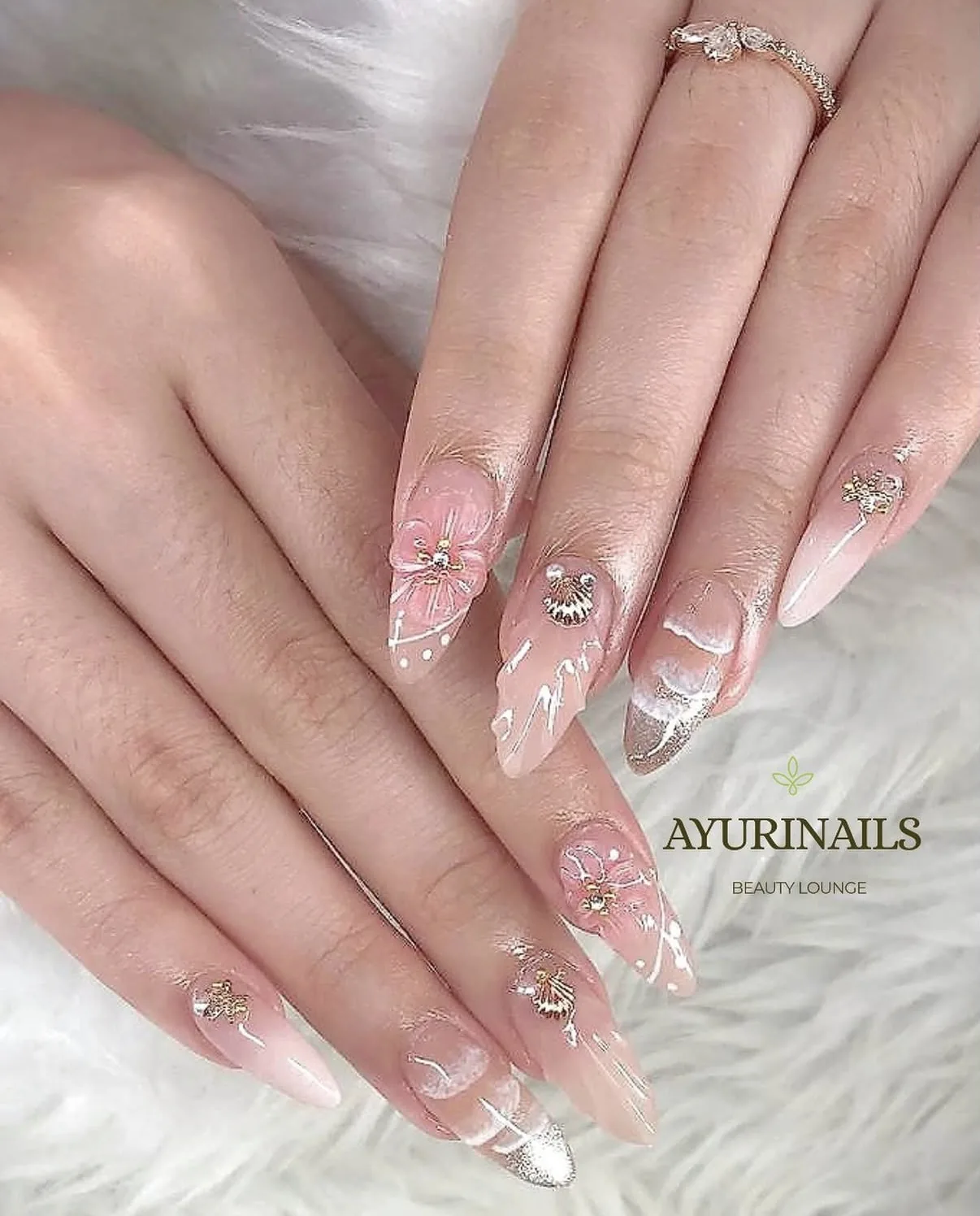 3D floral nail art with gold charms on nude nails, AyuriNails Beauty Lounge